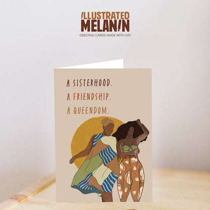 greeting card mock up that reads a sisterhood, a friendship, a queendom with illustrations of two black women standing next to each other in front of the sun