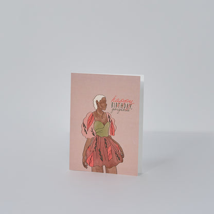 pink birthday card with faceless black women standing in floral dress 