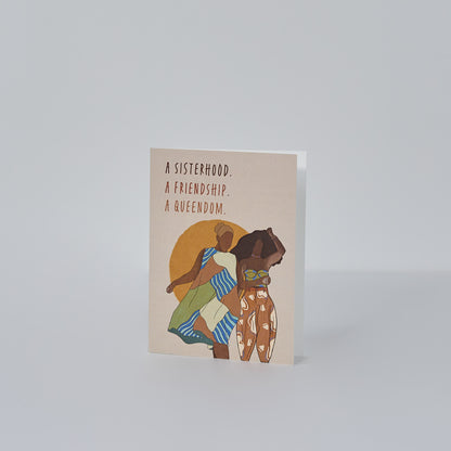 tan greeting card that reads a sisterhood, a friendship, a queendom with two black women standing next to each other in front of the sun
