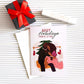 greeting card mock up of black couple sitting together on a yellow cushion with words above them reading happy holidays from us to you